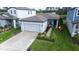Charming single-story home with landscaped front yard and two-car garage in a desirable neighborhood at 3329 Fresno Pl, Zephyrhills, FL 33541