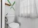 Modern toilet with custom decor and a large window that brings in plenty of natural light at 3333 26Th E Ave # 1090, Bradenton, FL 34208