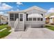 Charming single-Gathering home with a well-manicured lawn, complemented by a spacious driveway and inviting entrance steps at 3333 26Th E Ave # 1090, Bradenton, FL 34208
