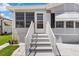 Charming single-Gathering home with a well-manicured lawn, complemented by inviting entrance steps and a screened porch at 3333 26Th E Ave # 1090, Bradenton, FL 34208