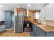 Well-designed kitchen with stainless steel appliances, butcher block countertops, and modern finishes at 3333 26Th E Ave # 1090, Bradenton, FL 34208