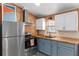 Efficient kitchen features updated appliances, sleek countertops, and ample storage at 3333 26Th E Ave # 1090, Bradenton, FL 34208