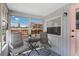Cozy screened patio with comfortable seating, perfect for relaxing and enjoying the outdoors, with views of the community at 3333 26Th E Ave # 1090, Bradenton, FL 34208