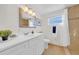 Bathroom featuring a white vanity with a mirror, toilet, and shower at 4059 Orient Dr, Hernando Beach, FL 34607
