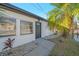 Charming home exterior with a well-manicured lawn, featuring a front door and windows at 4059 Orient Dr, Hernando Beach, FL 34607