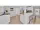 Eat-in kitchen featuring granite countertops, stainless appliances, and breakfast bar at 4059 Orient Dr, Hernando Beach, FL 34607