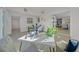 Open concept living room with stylish decor, modern furnishings, and lots of natural light at 4059 Orient Dr, Hernando Beach, FL 34607