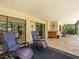 Covered patio with seating and an outdoor bar area, perfect for entertaining at 4209 Winding Willow Dr, Tampa, FL 33618