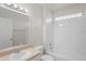 Bathroom featuring a shower-tub combo, modern vanity and medicine cabinet at 456 Summer Sails Dr, Valrico, FL 33594