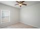 Bedroom with a neutral color scheme, window, and tile flooring at 456 Summer Sails Dr, Valrico, FL 33594