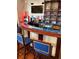 A fully stocked bar with ample seating and stylish decor at 4984 Beach Se Dr # B, St Petersburg, FL 33705