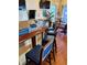 Stylish bar area with unique blue accents, comfortable seating and TVs at 4984 Beach Se Dr # B, St Petersburg, FL 33705