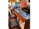 An inviting bar with elegant countertops and comfortable seating for relaxation at 4984 Beach Se Dr # B, St Petersburg, FL 33705