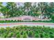 Community signage among meticulously landscaped grounds at Waterside at Coquina Key South at 4984 Beach Se Dr # B, St Petersburg, FL 33705