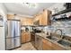 Efficient kitchen with stainless steel appliances, granite countertops, and ample cabinet space for all your culinary needs at 4984 Beach Se Dr # B, St Petersburg, FL 33705