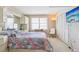 Bright bedroom with a floral comforter, large window, and closet at 5200 Brittany S Dr # 1501, St Petersburg, FL 33715