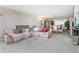 Open-concept living room featuring a spacious layout with plush seating and a dining area at 5200 Brittany S Dr # 1501, St Petersburg, FL 33715