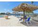 Enjoy the poolside tiki hut area, perfect for relaxing with bay views at 5200 Brittany S Dr # 1501, St Petersburg, FL 33715
