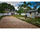 Spacious backyard with plenty of green space and a shed, perfect for outdoor activities and storage at 5628 2Nd N Ave, St Petersburg, FL 33710