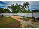 Large backyard area with stone and brick pavers, offering ample outdoor space for entertainment at 5628 2Nd N Ave, St Petersburg, FL 33710