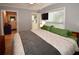Bedroom boasts ceiling fan, TV, closet and natural light at 5628 2Nd N Ave, St Petersburg, FL 33710