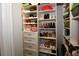 Organized closet with shelving and drawers, perfect for storage and keeping your belongings tidy at 5628 2Nd N Ave, St Petersburg, FL 33710