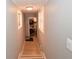 Hallway leading to a laundry room with updated appliances and ample space for laundry tasks at 5628 2Nd N Ave, St Petersburg, FL 33710