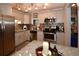 Well-appointed kitchen boasting stainless steel appliances, granite countertops, and ample cabinet space at 5628 2Nd N Ave, St Petersburg, FL 33710