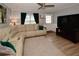 Comfortable living room with a large TV, neutral sectional sofa and a bright, airy feel at 5628 2Nd N Ave, St Petersburg, FL 33710