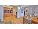 Dining area adjacent to the kitchen, featuring a table, chairs, and connecting rooms at 5695 40Th N Ave # 301, Kenneth City, FL 33709