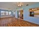 Bright and sunny living space featuring wood floors at 608 Fort Duquesna Dr, Sun City Center, FL 33573