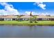 A well-maintained backyard with direct water access and private outdoor space at 6327 Positano Ct, Sarasota, FL 34243