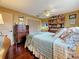 Bedroom with a hardwood floors, dresser, and bookshelf at 760 Capri Blvd, Treasure Island, FL 33706