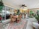 Inviting dining area with a stylish table set, chairs, and decor creating an ideal setting for gatherings and meals at 760 Capri Blvd, Treasure Island, FL 33706