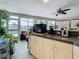 Well-lit kitchen equipped with modern appliances, beautiful countertops, and serene views, blending functionality with relaxation at 760 Capri Blvd, Treasure Island, FL 33706