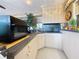 Bright kitchen featuring modern appliances, ample countertop space, and stylish cabinetry, perfect for culinary enthusiasts at 760 Capri Blvd, Treasure Island, FL 33706
