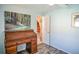 Home office featuring a rolltop desk and natural light, with a glimpse of the stone archway at 7699 92Nd St, Seminole, FL 33777