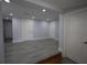 Expansive finished basement area with multiple access doors and recessed lighting at 8405 N Willow Ave, Tampa, FL 33604