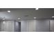 Spacious living room with recessed lighting and gray flooring at 8405 N Willow Ave, Tampa, FL 33604