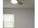 Neutral room featuring blinds, a ceiling fan and ample natural light at 8405 N Willow Ave, Tampa, FL 33604