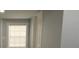 Neutral room featuring blinds, white walls and ample natural light at 8405 N Willow Ave, Tampa, FL 33604