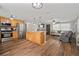 Spacious kitchen featuring stainless appliances and a functional island, that opens up to the living room at 903 Dixie Maid Ln, Valrico, FL 33594