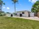 A lovely single-story home with a well-maintained lawn, a pool, and a privacy fence at 9109 134Th Way, Seminole, FL 33776