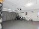 Spacious garage with bikes and door to the outside at 9109 134Th Way, Seminole, FL 33776