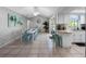 Open floorplan, kitchen with a breakfast bar and a dining area that includes table and chairs at 9109 134Th Way, Seminole, FL 33776