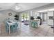 Open floorplan, kitchen featuring a breakfast bar and an adjacent dining area with seating at 9109 134Th Way, Seminole, FL 33776