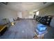 Spacious garage with ample storage and work space for projects at 105 E North Branch Rd, Ruskin, FL 33570