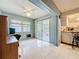 View of a Florida Room with tile floors and sliding door access to the outdoors at 1102 Cara Dr, Largo, FL 33771