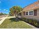 Charming single-story home featuring well-maintained landscaping and attractive stone accents at 1102 Cara Dr, Largo, FL 33771