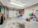 The attached garage offers ample space for storage and parking at 1102 Cara Dr, Largo, FL 33771